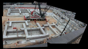 This photo, taken early in construction, shows the Resource Center's stack-cast tilt-frame system. - Photo Credit: Murray Legge