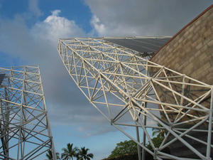 This photograph shows the space frames supporting the PV array. - Photo Credit: Ferraro Choi