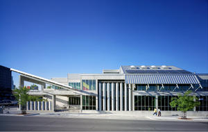 The south side of the Austin Resource Center for the Homeless includes rainwater collection tanks, shown here. - Photo Credit: Thomas McConnell