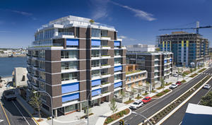 Synergy at Dockside Green is shown from the southeast in this rendering. - Photo Credit: Enrico Dagostini