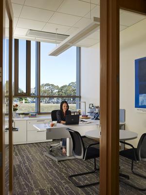 Private office with ample daylight an operable windows. - Photo Credit: © Nick Merrick
