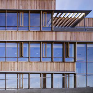 Operable windows shown from exterior. - Photo Credit: © Nick Merrick