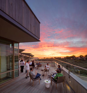 Materials used throughout the building (many shown in this view at the top level of the office/admin wing) were selected for their longevity, low maintenance, and contribution to the building performance. - Photo Credit: © Tim Griffith