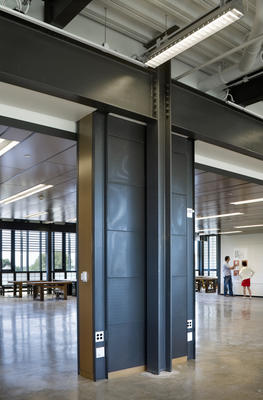 Displacement air diffusers, shown in this photo, are integrated into the design and provide energy efficiency and thermal comfort. - Photo Credit: © Peter Aaron, Esto