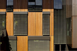 Dynamic exterior blinds keep unwanted sun out of southwest-facing interiors. - Photo Credit: Jeremy Bittermann