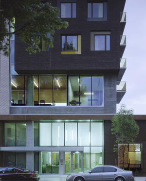 A close-up of durable, sustainable materials including local brick, local concrete, and recycled weathering steel. - Photo Credit: Sally Schoolmaster