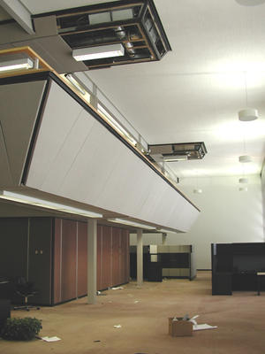 Building C1 is a two-story office building originally constructed in 1974 to house Herman Miller's executive leadership team. This photo shows the building's existing condition prior to renovation. - Photo Credit: Krueck & Sexton