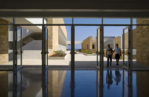 This photograph shows the view through the doors of the theater lobby - Photo Credit: Paul Crosby Studio