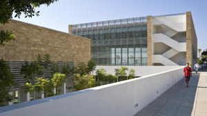 This photograph shows the upper terrace, pool building and cafe courtyard below. - Photo Credit: Paul Crosby Studio
