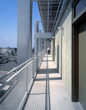 A typical walkway to living units is shown in this photograph. - Photo Credit: Marvin Rand