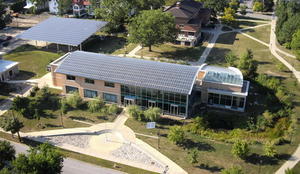 This is an aerial view of the Oberlin College Lewis Center highlighting the PV arrays. - Photo Credit: John Petersen, Oberlin College