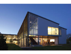 This photo shows the view of IFAW's World Headquarters from the courtyard meadow. - Photo Credit: © Peter Vanderwarker 2008