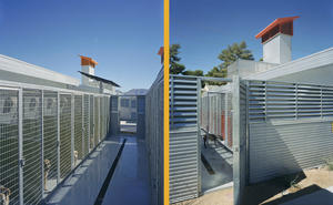 This exterior view of the dog kennels highlights the washdown drain. All washdown water is directed to the onsite treatment plant. - Photo Credit: Tom Bonner