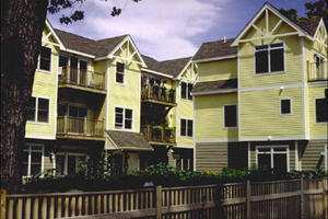 This exterior photo shows the Cohousing development next to the street. Amenities including shopping, services, restaurants, etc. are within walking distance of the development.