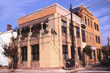Photovoltaic panels are visible from the front of the this urban building, shown here. - Photo Credit: Green Building Alliance