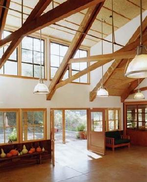 Salvaged fir trusses and the rye-grass ceiling are shown in this photograph. - Photo Credit: Ed Caldwell