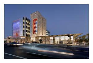 View of council chamber and courtyard at night - Photo Credit: SmithGroupJJR