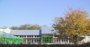 This photo shows the exterior of Cusano Center. - Photo Credit: Susan Maxman & Partners