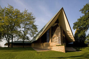 Completed in 1951, the original Frank Lloyd Wright-designed Meeting House shown in this photo was designated by the American Institute of Architects as one of seventeen buildings to be retained as an example of Wright's contribution to American culture. In 2004, it was declared a National Historic Landmark. - Photo Credit: The Kubala Washatko Architects, Inc. / Zane Williams