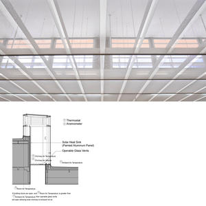 The photo shows a view of the solar vent and microporous ceiling; the section drawing detail shows the solar vent design. - Photo Credit: Paul Crosby/VJAA