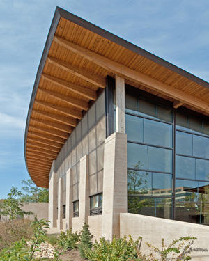 The mechanically assisted air intake louvers shown in the photo along the building's south wall provide natural ventilation. - Photo Credit: The Kubala Washatko Architects, Inc. / Zane Williams