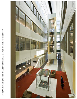 This photo highlights the building’s daylight atriums, one of the strategies for providing 75 percent of the building with a minimum 25 Fc of sunlight. Artificial lighting energy is reduced by over 60 percent. - Photo Credit: Don F. Wong