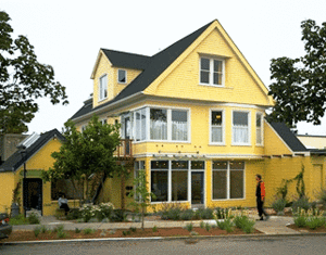 The Adeline Street Urban Salvage Project, including two commercial units at street level and two residential units above, is shown in this photo. - Photo Credit: Ethan Kaplan