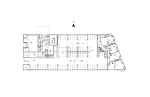 The parking is enclosed within the building, as shown in this drawing. - Photo Credit: Office dA / Burt Hill