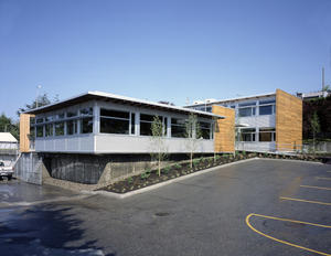 On-site parking, shown in this photo, is sufficient for the staff and does not exceed the City’s parking requirements. Preferred parking stalls are reserved for carpool vehicles. - Photo Credit: Colin Jewall