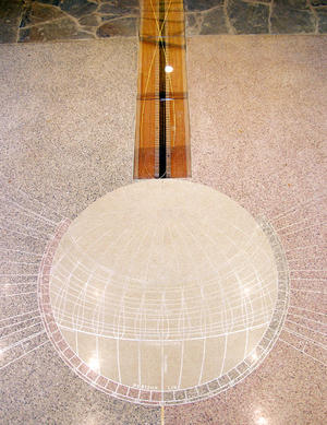 The sky map, inlaid in the floor below the roof aperture, is shown in this picture. - Photo Credit: Ron Sprouse