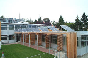 A solar-panel array demonstration project, shown in this photo, generates approximately 5% of the building’s energy. - Photo Credit: Project Staff