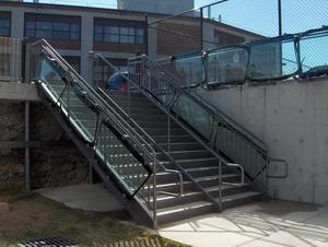 Shown here is the guardrail system, which incorporates junked automobile windshields. The concept arose out of a desire to reuse materials. - Photo Credit: Jorge Barrientos - UMass Lowell