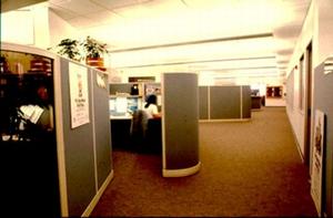 This interior photograph shows flexible office furniture and energy-efficient lighting. - Photo Credit: Platt/Whitelaw Architects--Natalie Fiocre