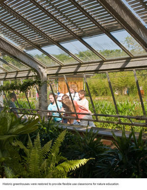 Historic greenhouses, like the one in this photograph, were restored to provide flexible educational spaces. - Photo Credit: Hester + Hardaway Photography