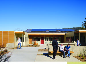 Entry Courtyard at Residence with solar thermal and photovoltaic panels - Photo Credit: Tim Griffith