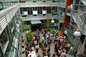 This is a photograph of one of the many gatherings that public and private organizations have held in the courtyard. - Photo Credit: Gabe Hanson