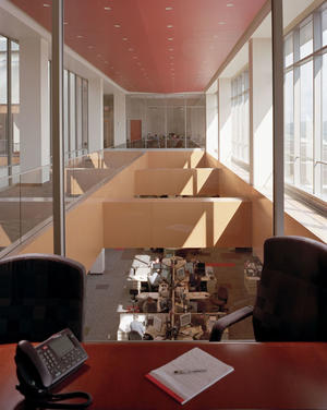 In this photo, a daylit office overlooks cubicles on the trading floor. - Photo Credit: Peter Aaron - Esto