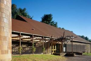 This photo shows the building's front entrance. - Photo Credit: Nic Lehoux