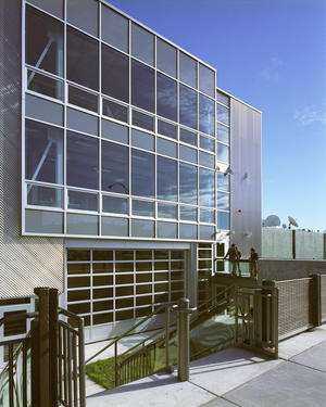 This photograph of the gallery entrance shows the sunken urban "garden." - Photo Credit: Richard Mandelkorn