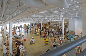 This photograph shows the natural light from the south reaching deep into the top level painting studio. - Photo Credit: Richard Mandelkorn