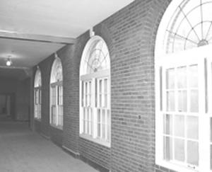 This photo shows the cloister before the renovation. - Photo Credit: Susan Maxman & Partners