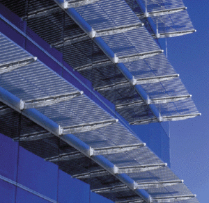 The narrow slab dimension coupled with full-height glass provides daylight access, which significantly reduces energy consumption. The sunshades shown in this photograph prevent glare from direct sunlight. - Photo Credit: Daniela MacAdden