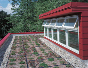 Sedum on the roof, shown in this photograph, acts as an insulator through evaporative cooling to reduce energy consumption. It also retains stormwater, reducing the impact on Chicago's sewer system; eliminates the effects of UV rays, lengthening the life of the roofing membrane; and mitigates the urban heat-island effect. This self-sufficient plant lives year-round and does not require watering or upkeep. - Photo Credit: Doug Snower Photography