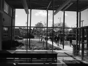 Children are visible in this photo through the large windows in the center's lobby.