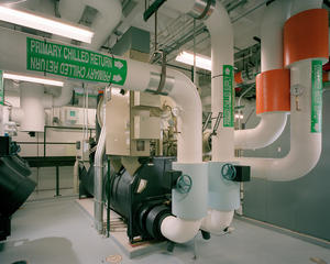 The mechanical room, with its new ground-source heat pump, can be seen in this photograph. - Photo Credit: Barry Halkin Photography