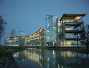 This photo shows the stormwater pond and the view of the building from the west. - Photo Credit: Timothy Hursley
